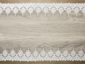 Koronka złamana biel 0.45 x 9 m